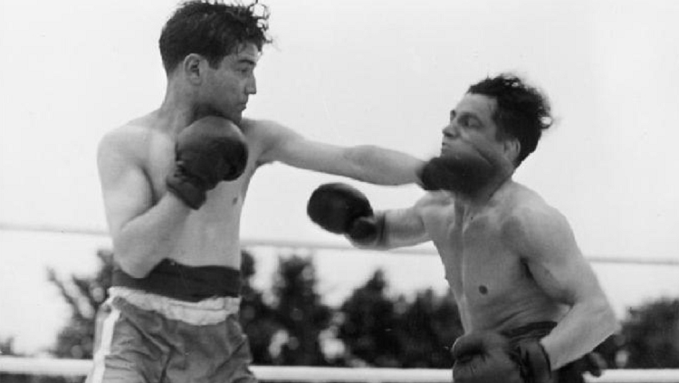 black and white image of two boxers in a ring