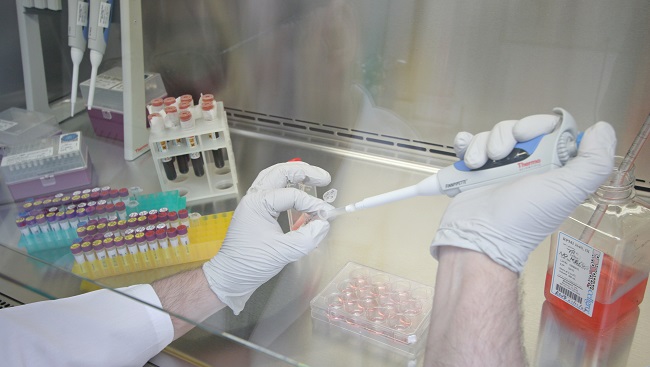 A man using a pipette