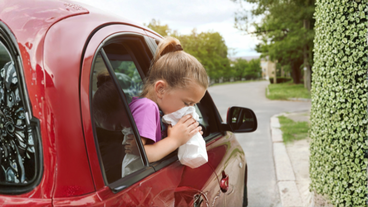 Young girl car sick